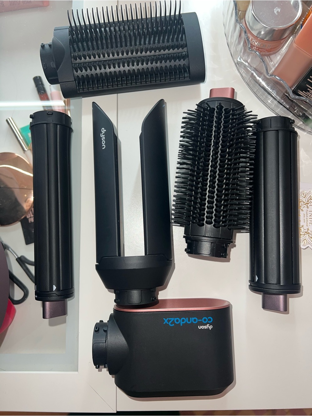 Dyson black and rose gold Co-and-dx2 styling attachment set